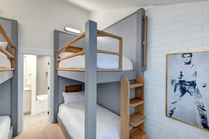 The third bedroom with a custom built in twin bunk bed.