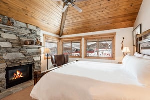 Main suite with a gas burning fireplace, overlooking Park City Mountain Resort