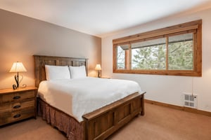 Queensized bed in the guest bedroom
