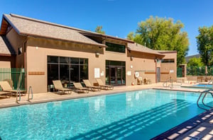 The community pool is open in the summer time.