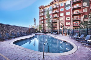 Outdoor pool deck, poolside lounge chairs