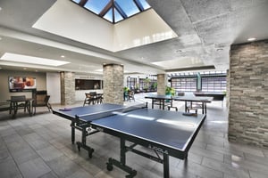 Ping pong tables by the indooroutdoor pool