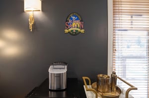 Your modern kitchen features convenient amenities like a bar cart and ice maker.