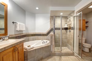 Unwind in your spacious bathroom featuring a relaxing soaking tub and separate walkin shower.