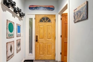 Step into your mountain retreat through this welcoming entrance, complete with ski storage.