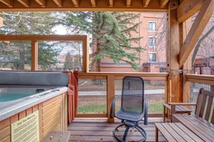 Relax in your private hot tub on the covered deck.