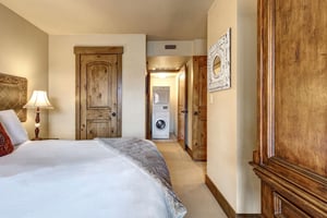 The main bedroom with a king size bed and en suite bathroom.