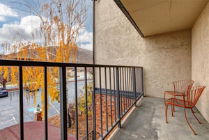 Step onto your private balcony with mountain views.