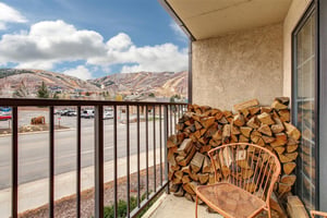 Step onto your private balcony with mountain views.