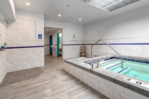 Relax and rejuvenate in your spa facilities and modern tile finishes.