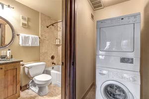 Enjoy a full bathroom with showertub combo, plus inunit washer and dryer for effortless stays.