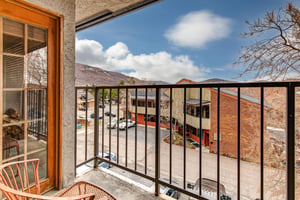 Step onto your private balcony and breathe in the crisp mountain air.