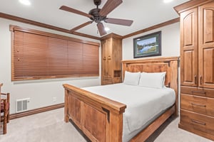 Rest peacefully in your handcrafted wooden bedroom, where rich cabinetry and crisp linens.