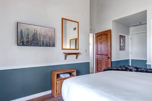 Drift off surrounded by mountain charm and thoughtful touches in your cozy retreat.