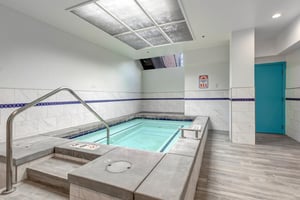 Unwind in the common area indoor hot tub.