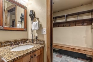 Your private bathroom features granite counters and hair dryer, plus custom storage closet for your belongings.