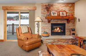 Curl up in your cozy leather chair by the crackling fireplace.