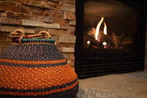 Cozy up by your crackling fireplace with stone hearth.