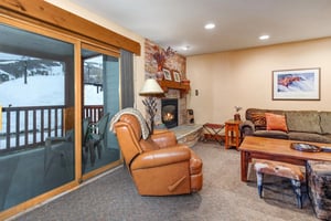 Sink into plush leather chair or upholstered couch by your the fireplace.