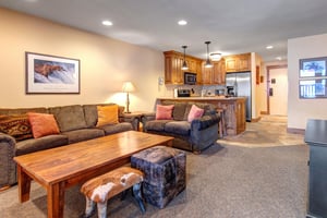 Relax in your spacious living room, seamlessly connected to a fullyequipped kitchen.
