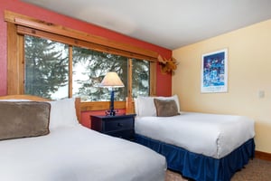 The second bedroom offers two full size beds.