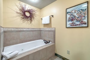 Slip into your private jetted tub surrounded by elegant tile work.