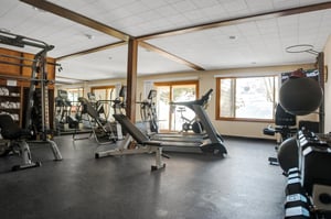 Stay active in your wellequipped fitness center with cardio machines, weights, and mountain views.