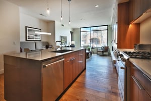 Beautiful hardwood floors throughout the main areas and wood finish cabinetry