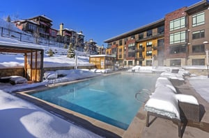 The Lift Condominiums pool deck on a bluebird day after a night of snow.