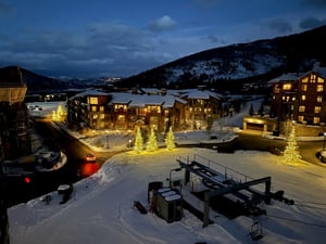Enchanting nighttime view of the ski hill with Christmas light accents