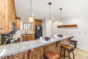 Snow Flower Condominium 14s breakfast bar dining for 2.