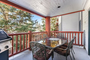 Snow Flower Condominium 14s outside private patio with table to seat 6.