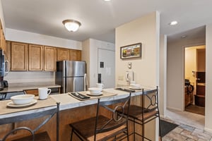 Snow Flower Condominium 147s counterspace eating next to open kitchen concept.