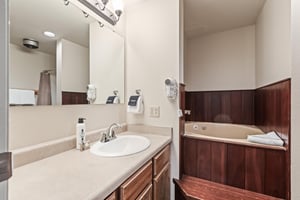 Snow Flower Condominium 147s main suite bathroom including jetted tub.