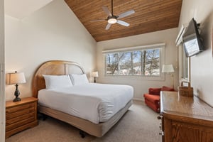Premier Snow Flower Condominium 130s main suite with king bed.