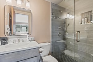 Premier Snow Flower Condominium 107s en suite bathroom with a walkin shower.