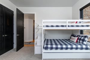 Cozy bunk beds with with built in stairs.