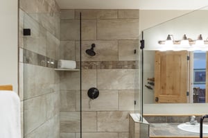 Tiled glass enclosed shower