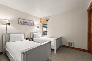 Snow Flower Condominium 149 offers a second bedroom with two twin beds.