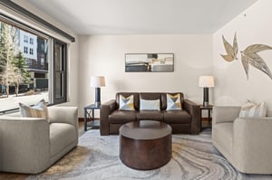 Unwind in a stylish living room at Lowell 203 on a plush couch and two loveseats with stylish finishes.
