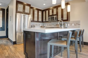 The kitchen island with seating for four guests.