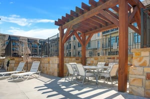 The Blackstone 3823 common area gazebo with a table and chairs for up to 6 guests.
