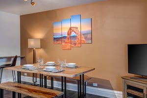 Resort Plaza 5024, a private vacation rental, offers a dining table with seating for four guests to have memorable meals.