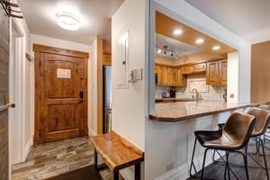 Step into your welcoming slopeside vacation rental where you can hang your skis in the foyer.