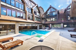 Resort Plaza offers an indooroutdoor pool with lounge chairs on the pool deck and outdoor hot tub.