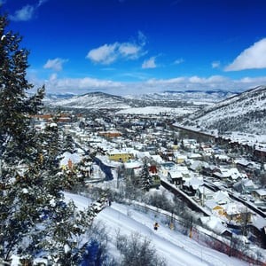 Views from Park City Mountains Town Lift of the snowy Historic District and surrounding mountains in Park City, Utah.