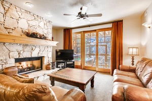 Comfortable living room cozy gas fireplace large screen TV  ParkCityLodging_TownPointeB203_LivingRoom