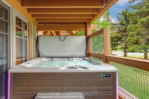 Unwind in your private hot tub on the covered private deck, after a day of exploring.