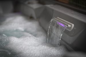 Unwind in your private hot tub, where warm bubbling waters and soothing LED lighting create the perfect evening escape after a day of adventure.