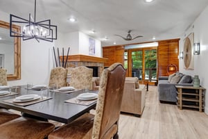 Unwind in your openconcept living space, with a dining table offering seating for 6 guests.